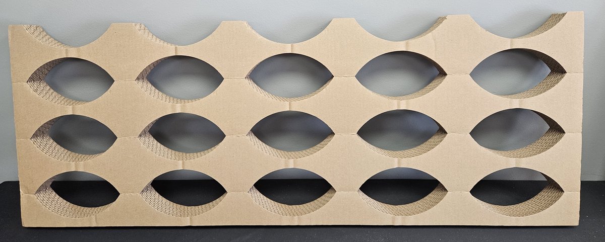 RollStringer™ corrugate roll support with three rows of five roll cradles